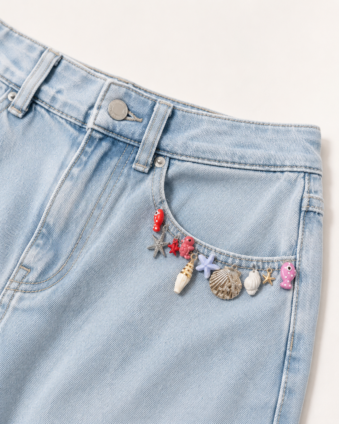 Sea charms on denim detail
